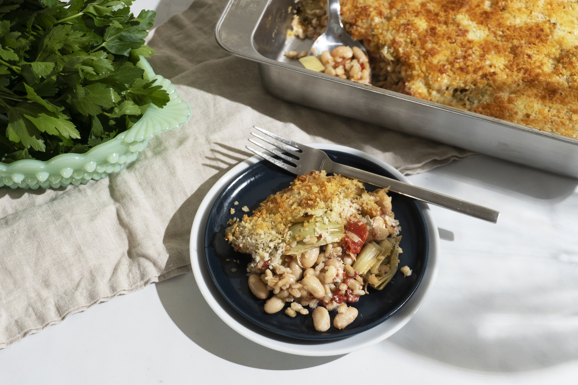 Creamy Barley, Artichoke, & White Bean Gratin
