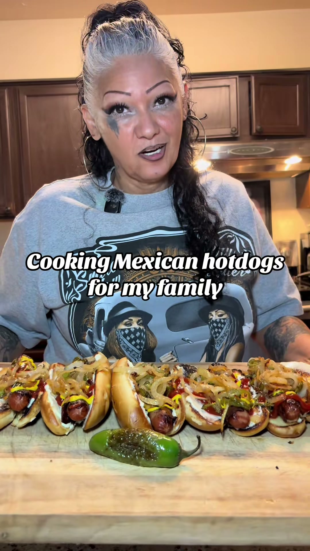 Bacon-Wrapped Hot Dogs With Sautéed Onions And Jalapeños