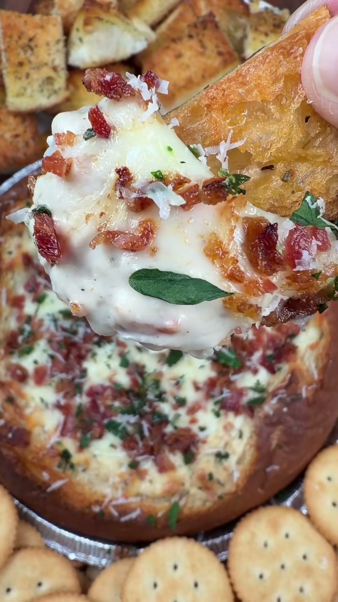 Cheesy Chicken Bacon Alfredo Dip in a Bread Bowl