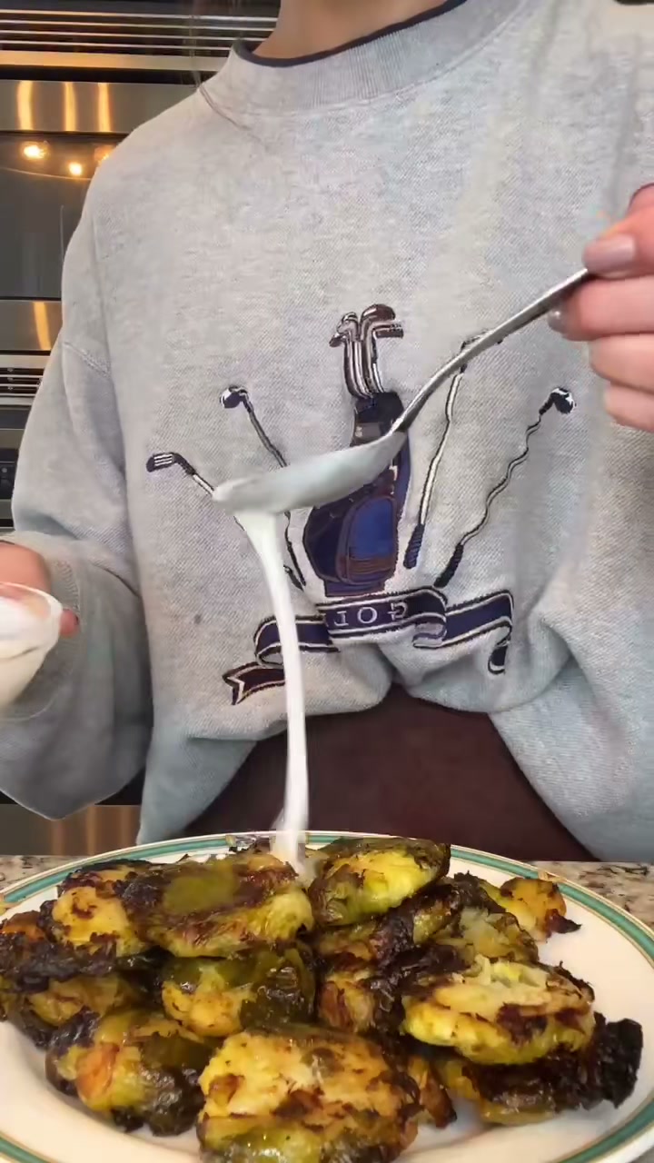 Smashed Brussels Sprouts with Lime Yogurt Drizzle