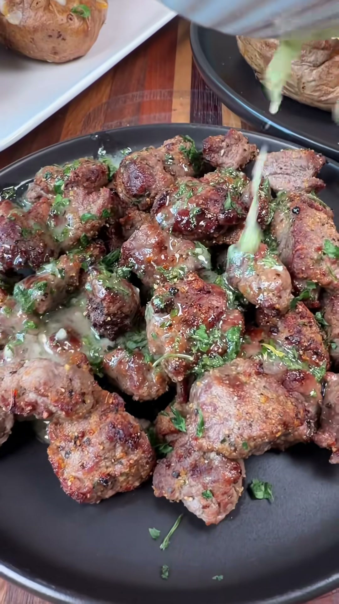 Garlic Butter Steak Bites with Loaded Baked Potatoes